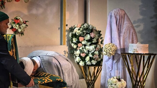 پرچم متبرک رضوی میهمان جشن عقد زوج جوان در سیدخلف اهواز/ گزارش تصویری