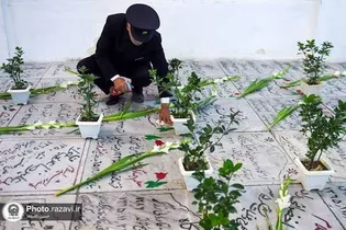 غبارروبی مزار شهدای بهشت ثامن الائمه(ع) توسط خادمان رضوی
