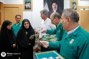 بازدید خادمیاران یگان صیانت حرم مطهر رضوی از شمیم رضوان و نمایشگاه رواق خدمت