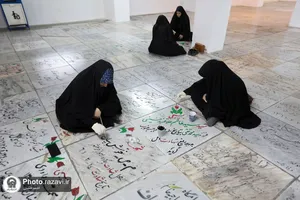 رنگ آمیزی قبور شهدای مدفون در بهشت ثامن&zwnj;الائمه حرم مطهر رضوی