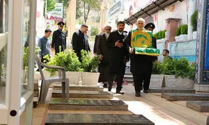 نسیم کرامت در دیار حاج قاسم/ پرچم رضوی برفراز مزار خادم&zwnj;الرضا / گزارش تصویری