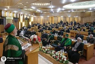 دست سیدالشهدا (ع)روی سر خانواده شهدا در جوار امام رئوف
