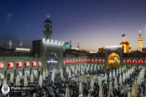 آیین تعویض پرچم گنبد منور رضوی در آستانه ماه محرم