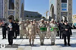 اهدا پرچم متبرک حرم امام حسین(علیه&zwnj;السلام) به حرم مطهر رضوی