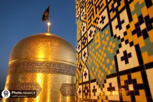 آیین تعویض پرچم گنبد منور رضوی در آستانه ماه محرم