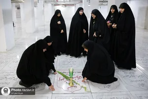غبارروبی مزار شهدای عاشورایی حرم مطهر رضوی
