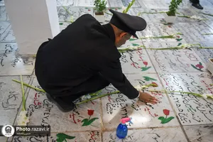 غباروبی مزار شهدای حرم مطهر رضوی