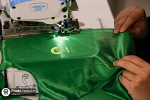 دوخت لباس مراسم شیرخوارگان حسینی در حرم مطهر رضوی