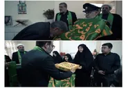 اهدای نشان سبز رضوی از سوی خادمان امام رضا (ع) به خانواده شهدای مدافع وطن