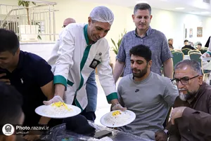 تشرف ملی&zwnj;پوشان کشتی ایران به حرم مطهر رضوی