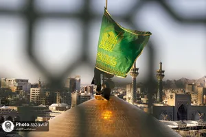 آیین تعویض پرچم حرم امام رضا علیه&zwnj;السلام در آستانه ماه ربیع الاول
