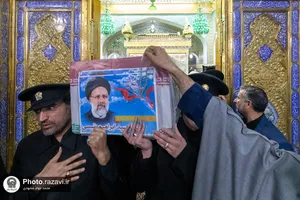 طواف پیکر شهدای خدمت دور ضریح مطهر رضوی
