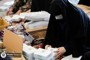 بسته&zwnj;بندی و توزیع افطاری سبک در حرم مطهر رضوی
