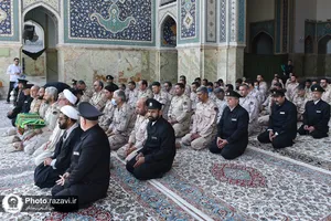 اهدا پرچم متبرک حرم امام حسین(علیه&zwnj;السلام) به حرم مطهر رضوی