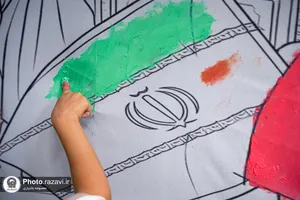 رنگ آمیزی دیوارنگاره توسط کودکان جهان اسلام یادبود شهدای مدرسه میناب