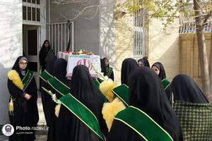 وداع با پیکر شهید گمنام دفاع مقدس در مدرسه دخترانه امام رضا علیه&zwnj;السلام