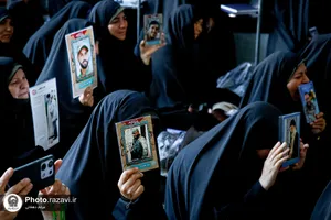 غبارروبی مزار شهدای مدفون در حرم مطهر رضوی