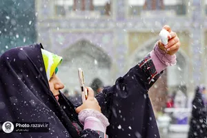 بارش برف در حرم مطهر رضوی