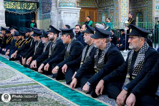 Flag-changing ceremony held at Hazrat Masumeh Shrine
