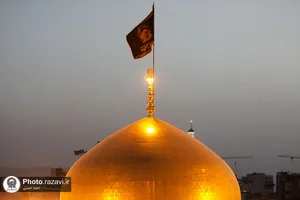 آیین تعویض پرچم گنبد منور رضوی به مناسبت آغاز ماه محرم