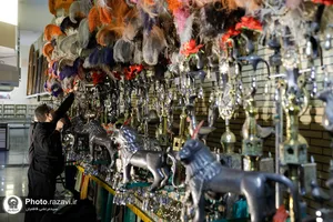 تنظیف علم شاه حسین در موزه آستان قدس رضوی