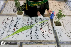 غبارروبی مزار شهدای مدفون در حرم مطهر رضوی