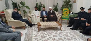 دیدار خادمین حرم رضوی با خانواده شهیده مدافع سلامت افسانه عموزاده