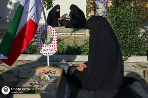 حضور خدام حرم مطهر رضوی در مزار شهدای هویزه