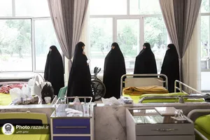 حضور خدام حرم مطهر رضوی در آسایشگاه جانبازان