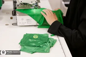 دوخت لباس مراسم شیرخوارگان حسینی در حرم مطهر رضوی