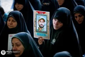 غبارروبی مزار شهدای مدفون در حرم مطهر رضوی