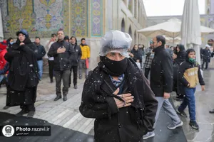 بارش برف در حرم مطهر رضوی