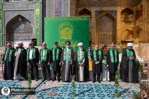 آیین تعویض پوش ضریح و پرچم گنبد منور رضوی در روز میلاد امام مهربانی&zwnj;ها