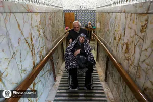 تشرف سالمندان و بیماران با صندلی چرخدار به روضه منوره رضوی