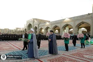 آیین تعویض پرچم حرم امام رضا علیه&zwnj;السلام همزمان با سوم ربیع الاول