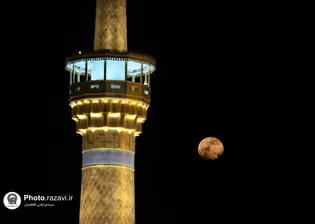 عکس با کیفیت : ماه گرفتگی در حرم مطهر رضوی
