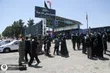 Pilgrims walk toward Imam Reza Shrine