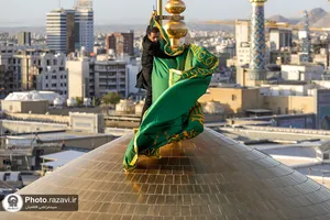 آیین تعویض پرچم حرم امام رضا علیه&zwnj;السلام در آستانه ماه ربیع الاول