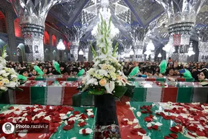 وداع با پیکرهای مطهر 12 شهید گمنام دفاع مقدس در مشهد