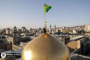 آیین تعویض پرچم حرم امام رضا علیه&zwnj;السلام در آستانه ماه ربیع الاول
