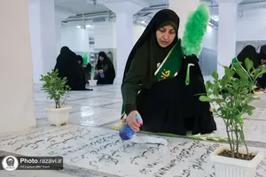 غبارروبی مزار شهدای مدفون در حرم مطهر رضوی