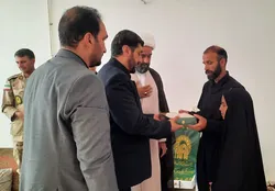 پرچم متبرک رضوی مهمان خانواده شهدای جنگ رمضان در ایلام شد