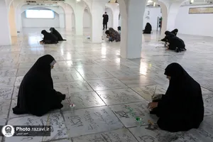 رنگ آمیزی قبور شهدای مدفون در بهشت ثامن&zwnj;الائمه حرم مطهر رضوی