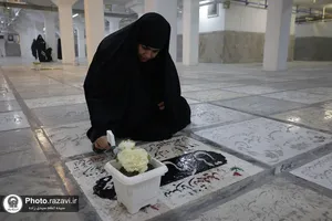 آیین غبارروبی مزار شهدای مدفون در حرم مطهر رضوی-1