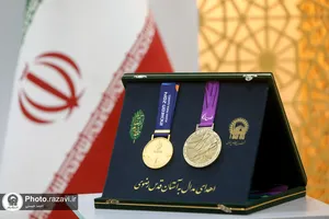 اهدای مدال&zwnj;های طلای پیمان نصیری به موزه آستان قدس رضوی