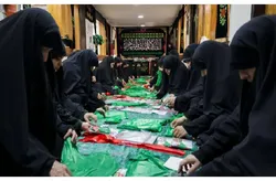 تهیه پارچه و دوخت ۱۱ هزار لباس ویژه مراسم شیرخوارگان حسینی از سوی خدمه خواهر حرم مطهر رضوی