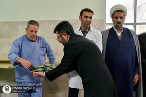 توزیع غذای متبرک حضرت در آسایشگاه جانبازان