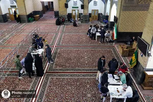 هم&zwnj;نویسی اساتید خوش&zwnj;نویسی ساوجبلاغ در حرم مطهر رضوی