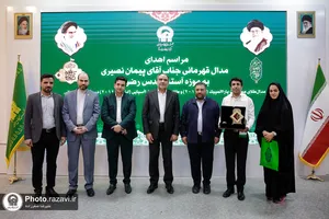 اهدای مدال&zwnj;های طلای پیمان نصیری به موزه آستان قدس رضوی
