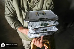 توزیع غذای گرم بین سیل زدگان منطقه طرق مشهد